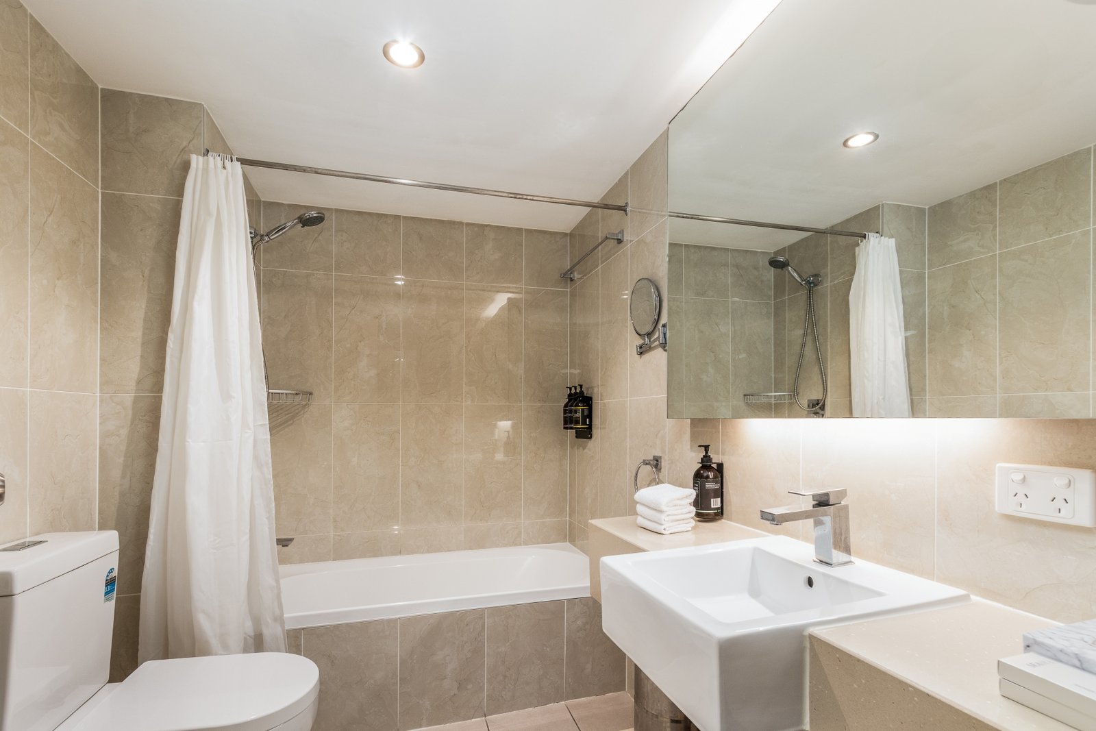 Guest Bathroom in a Deluxe Queen Single Guest Room at Hotel Diana Woolloongabba